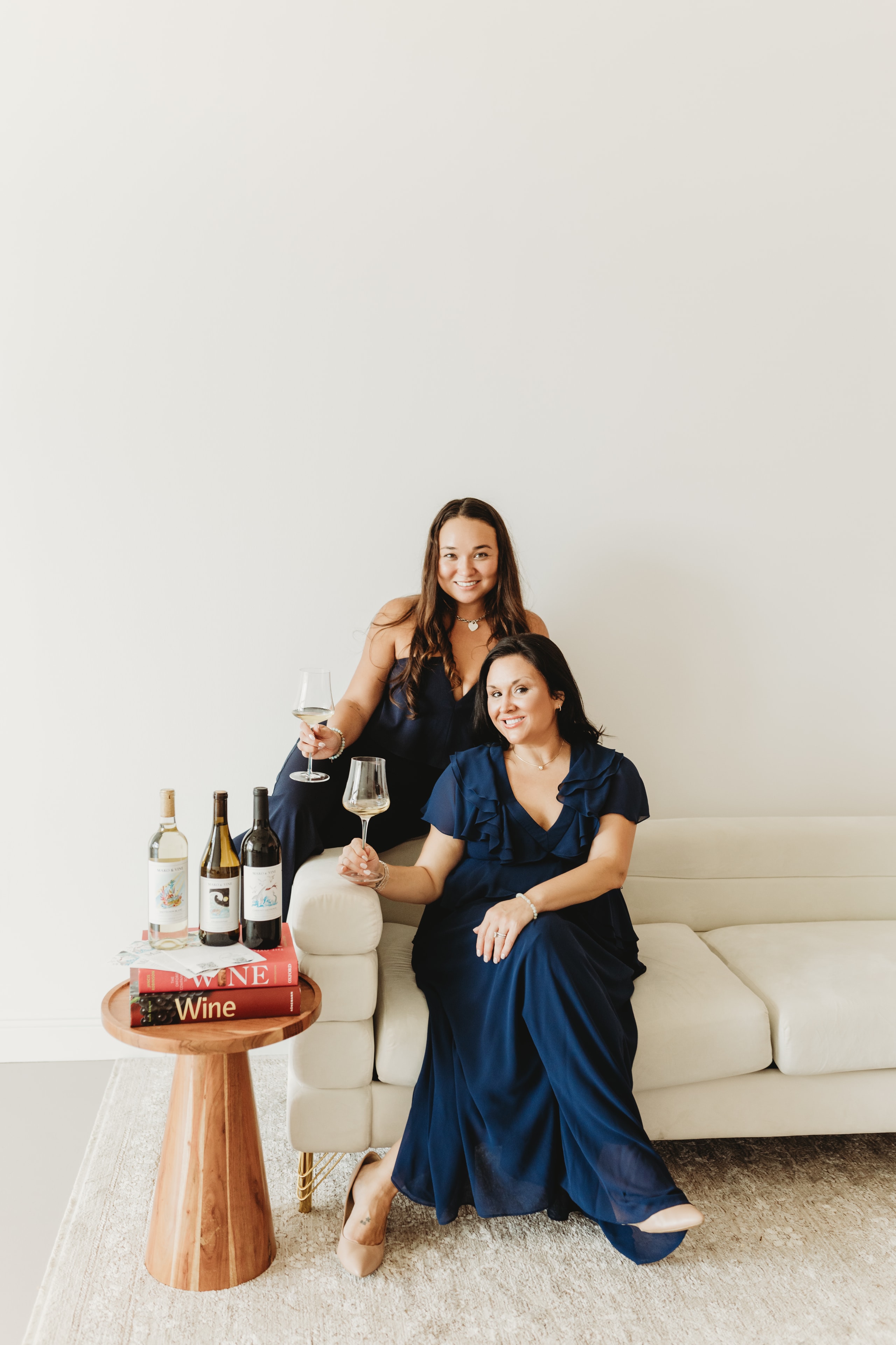 Lauren and Riley with Mako and Vine wine bottles